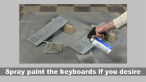 spray painting two keyboards