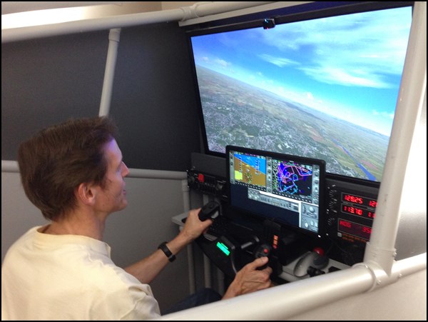 Fred flies the Home Flight Simulator
